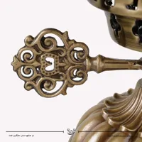 جفت شمعدان لاله ای تراش خورده با بدنه برنجی طرح خورشیدی