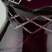 جفت شمعدان لاله ای تراش خورده با بدنه برنجی طرح خورشیدی